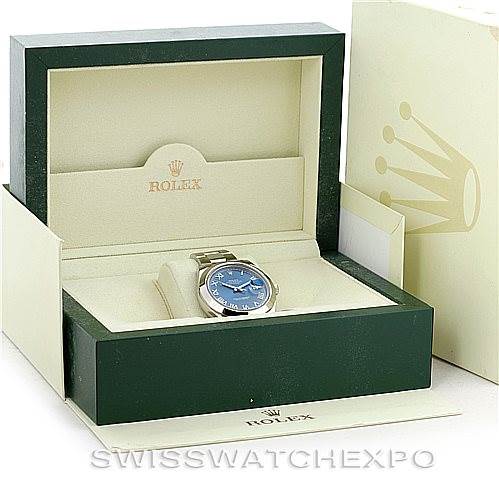 The image shows a Rolex Datejust 41 116300 Men's Stainless Steel Blue Dial 116300 Men's Stainless Steel Blue Dial watch with a blue dial in an open green and beige branded box.