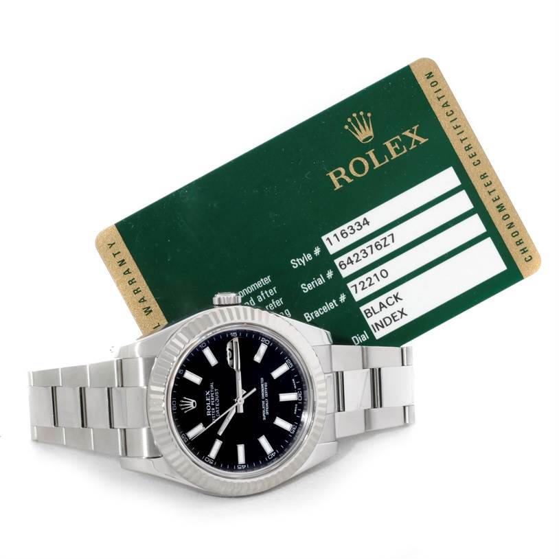 The image shows a Rolex Datejust 41 116334 Men's Stainless Steel Black Dial 116334 Men's Stainless Steel Black Dial watch lying down with its black dial and bracelet visible, alongside its certification card.