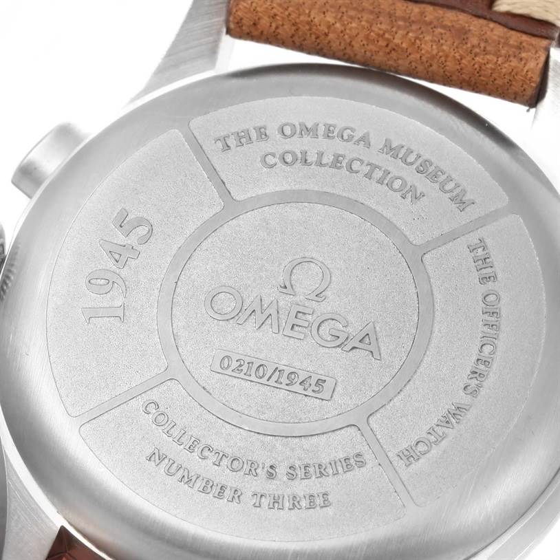 The image shows the case back of an Omega Museum 5702.50.02 Men's Stainless Steel Black Dial 5702.50.02 Men's Stainless Steel Black Dial model watch, featuring engraved details and part of the leather strap.