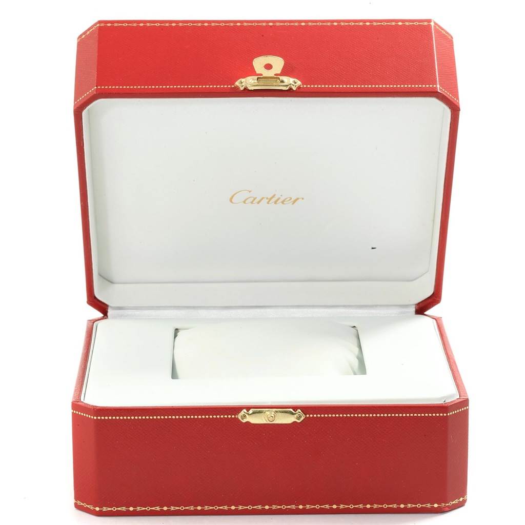 The image shows an open red Cartier box for the Cle model watch, displaying its interior.