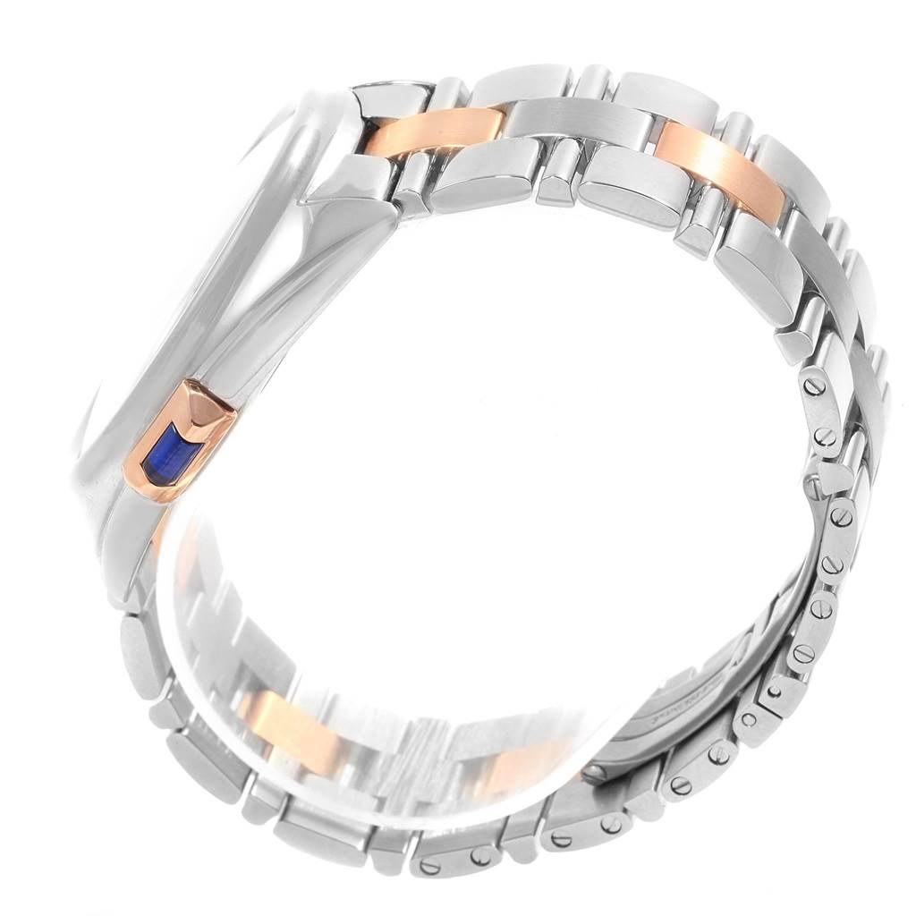 The image shows a side view of the bracelet and part of the case of the Cle model by Cartier.