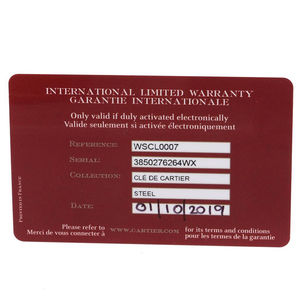 The image shows the warranty card for the Clé de Cartier watch.