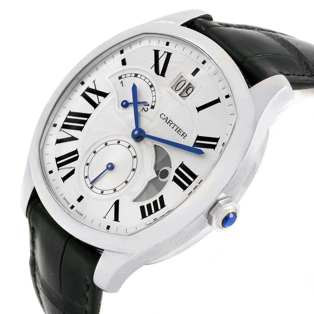 The image shows a close-up of the Drive de Cartier watch by Cartier, highlighting its dial, Roman numerals, blue hands, and black leather strap.