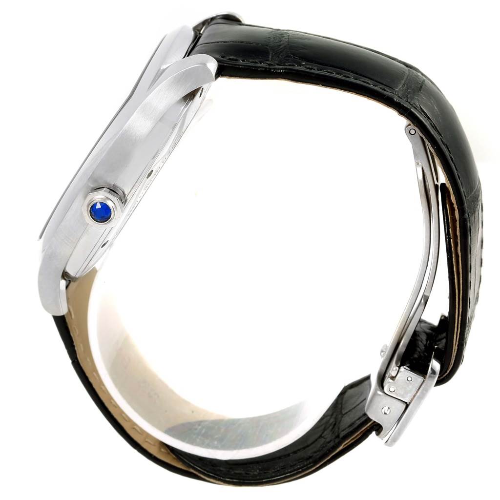 The image shows a side view of the Drive de Cartier watch by Cartier, highlighting the crown, case, and leather strap.