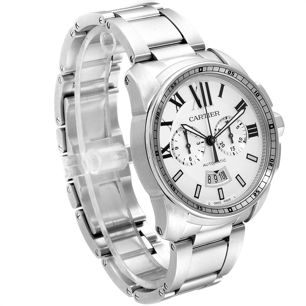 The image shows a Calibre de Cartier watch by Cartier at a 3/4 angle, highlighting the watch face and metal bracelet.