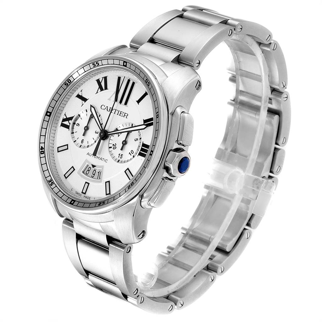 The Calibre de Cartier watch by Cartier is shown at a three-quarter angle displaying its dial, bezel, crown, and metal bracelet.