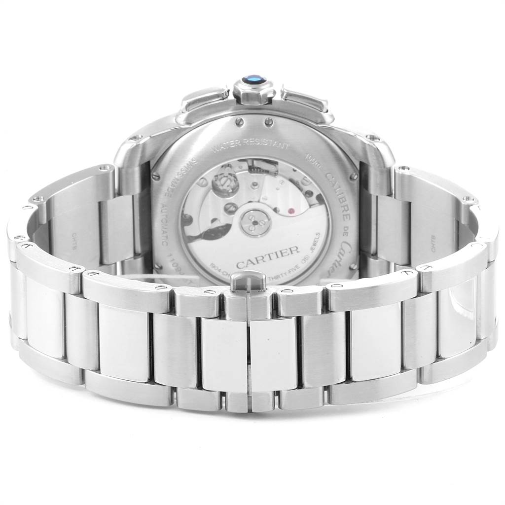 The image shows the back view of a Calibre de Cartier model by Cartier, highlighting the movement and bracelet.