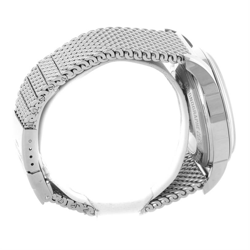 This image shows a side view of the Transocean model by Breitling, highlighting the mesh bracelet and part of the case.