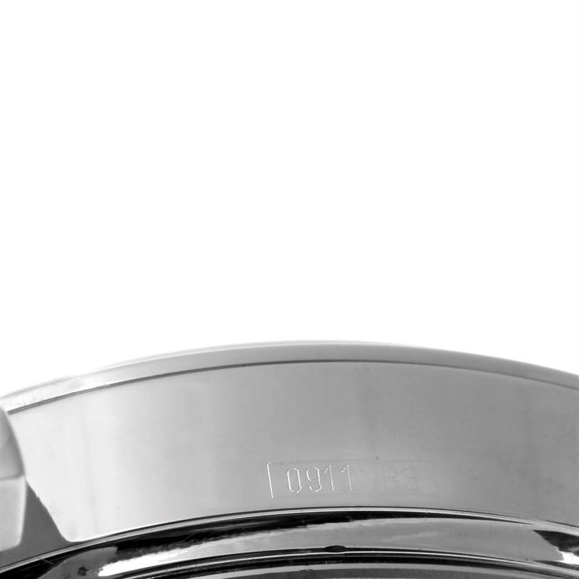 This image shows a close-up of the side of the case of the Breitling Transocean AB015212/G724-154A Men
s Stainless Steel Silver Dial AB015212/G724-154A Men
s Stainless Steel Silver Dial watch, highlighting the model
s serial number.