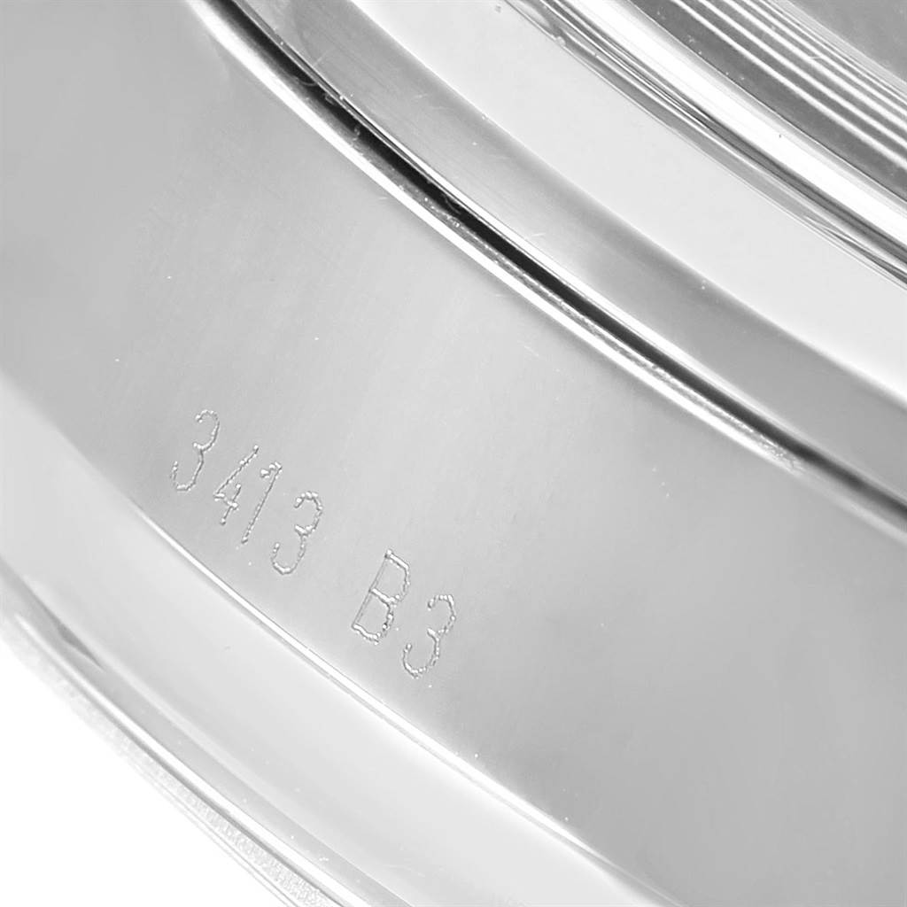 This image shows a close-up of the case back of a Breitling Transocean A41310 Stainless Steel Black Dial A41310 Stainless Steel Black Dial watch with engraved reference numbers.