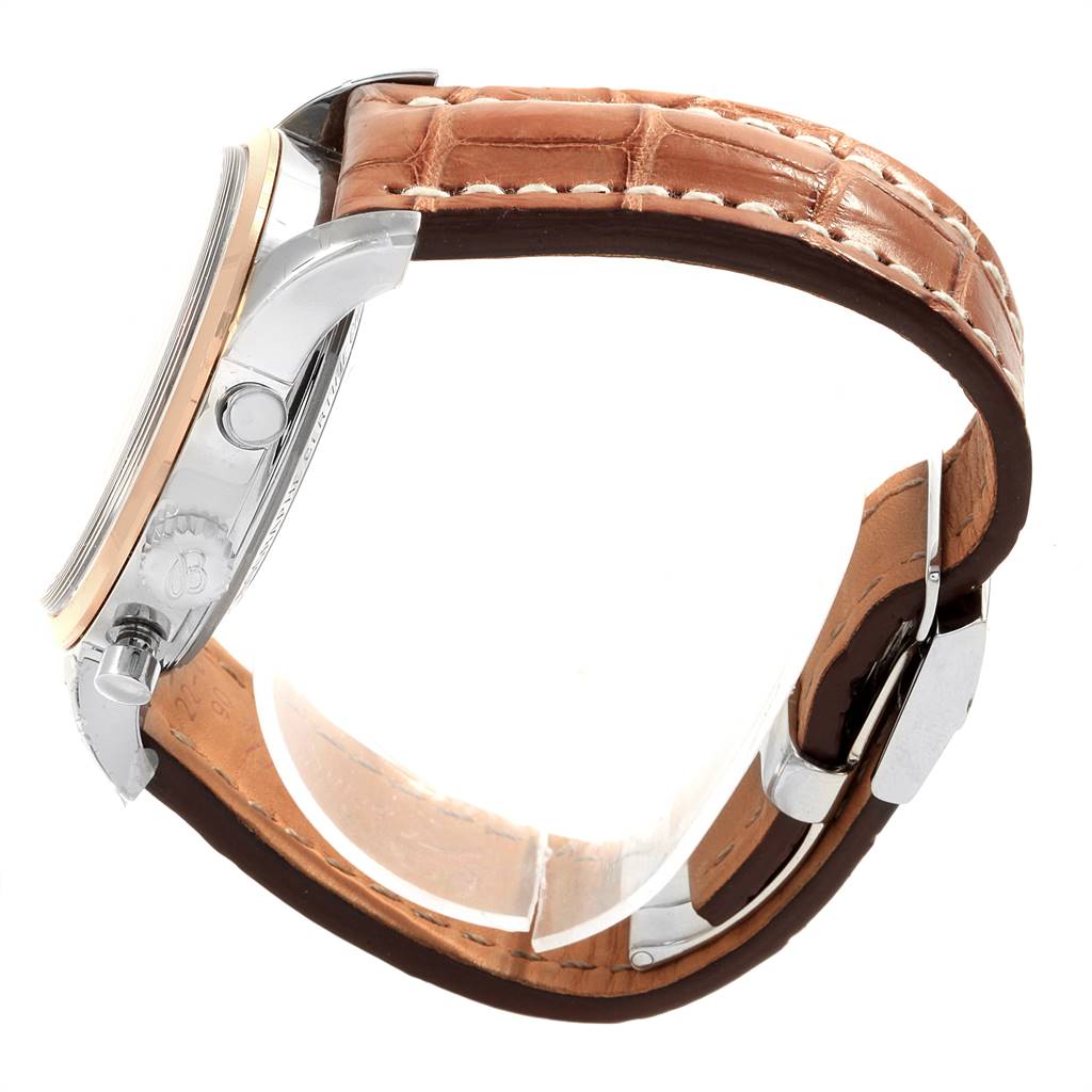 The image shows a side view of the Breitling Transocean UB0152 Men's Stainless Steel Black Dial UB0152 Men's Stainless Steel Black Dial watch, highlighting the case, crown, and leather strap.