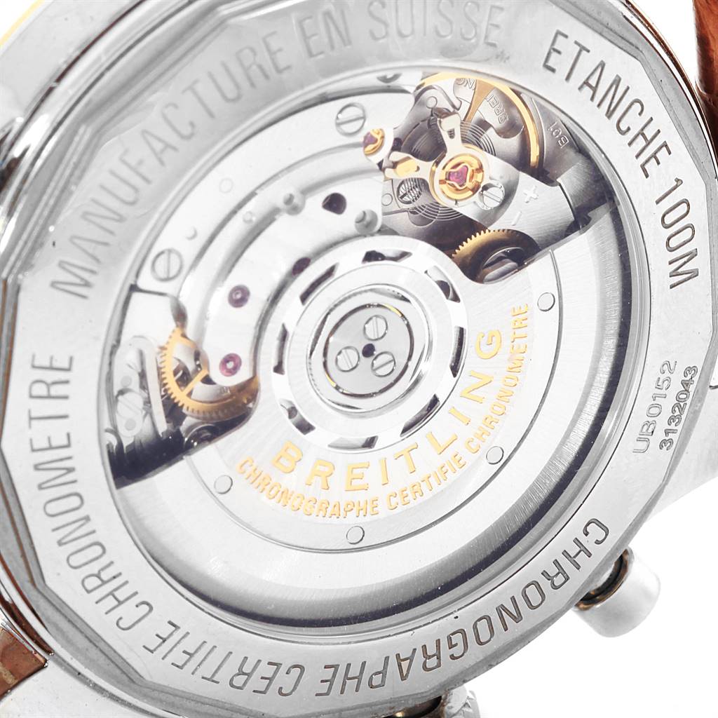 The image shows the back angle of the Breitling Transocean UB0152 Men's Stainless Steel Black Dial UB0152 Men's Stainless Steel Black Dial watch, revealing its internal mechanism and engravings.