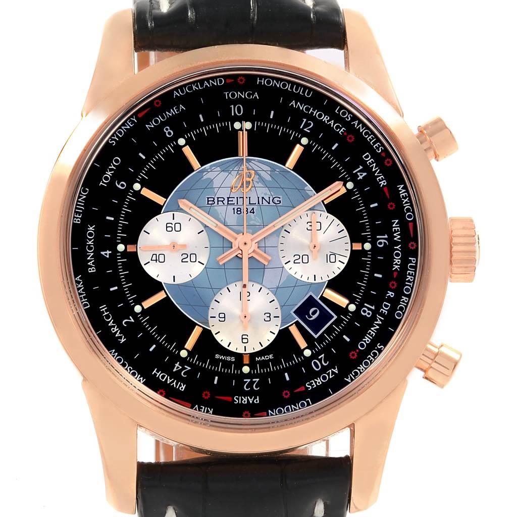 The image shows a front view of the Breitling Transocean RB0510U4-BB63BKLD Men's Rose Gold Black Dial RB0510U4-BB63BKLD Men's Rose Gold Black Dial watch, displaying its dial, subdials, and world time bezel.