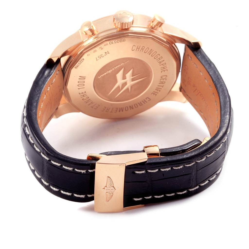 This image shows the back case and strap of a Breitling Transocean RB0510U4-BB63BKLD Men's Rose Gold Black Dial RB0510U4-BB63BKLD Men's Rose Gold Black Dial watch, highlighting the clasp and engraved caseback.