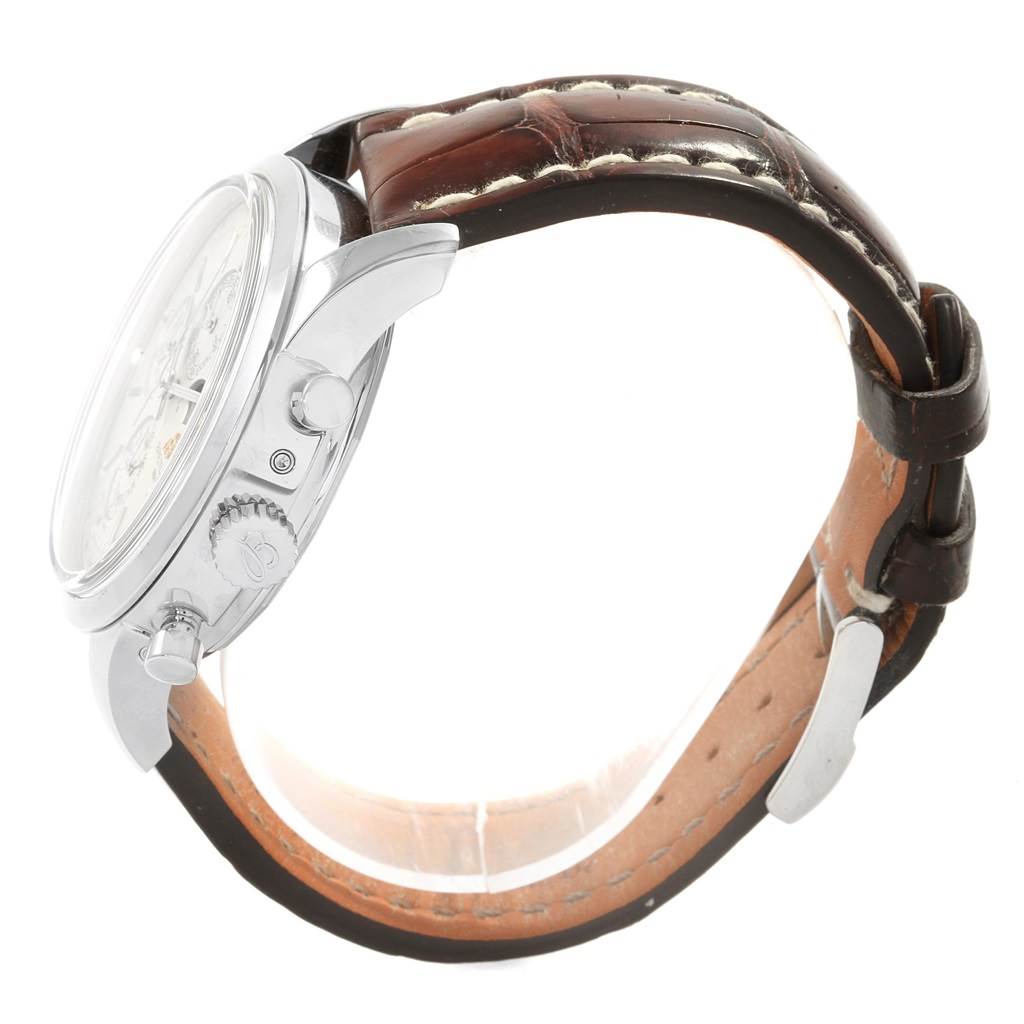 This image shows a side view of a Breitling Transocean A19310 Men's Stainless Steel Silver Dial A19310 Men's Stainless Steel Silver Dial watch, highlighting the crown, chronograph pushers, and brown leather strap.