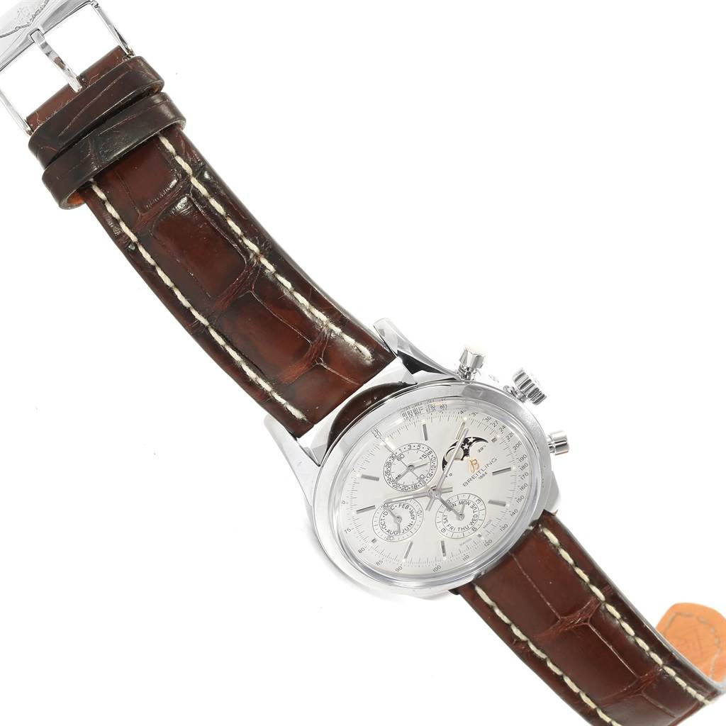 The image shows a Breitling Transocean A19310 Men's Stainless Steel Silver Dial A19310 Men's Stainless Steel Silver Dial watch at an oblique angle, highlighting the dial, case, and brown leather strap.