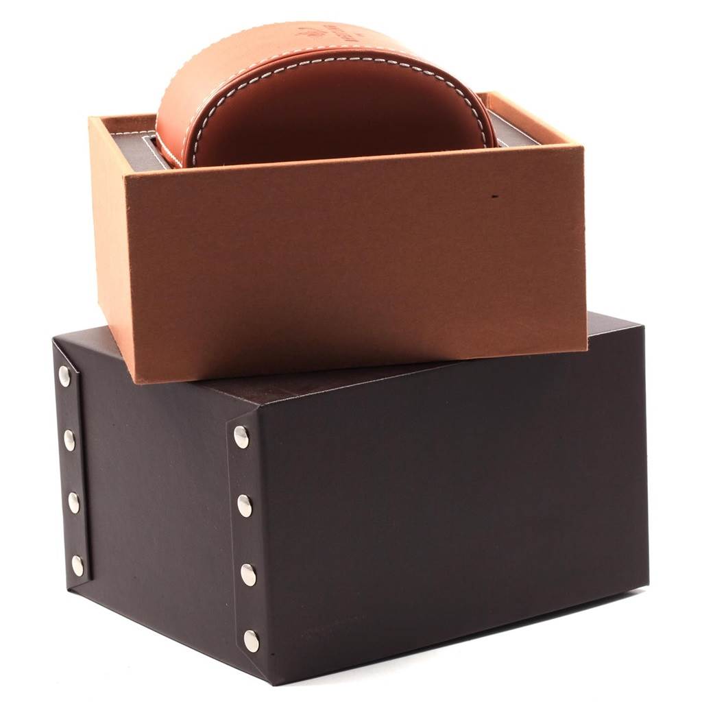 The image shows the packaging of the Transocean model by Breitling, including the outer box and leather case.