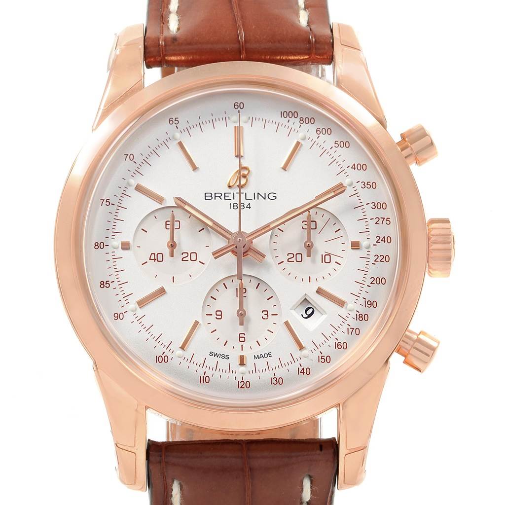 The Breitling Transocean RB0152 Men's Rose Gold Silver Dial RB0152 Men's Rose Gold Silver Dial watch is shown from the front angle, displaying the dial, subdials, bezel, and leather strap.