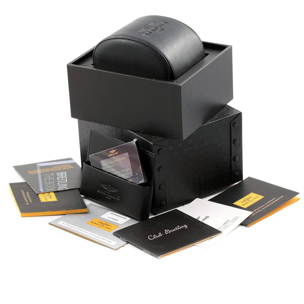 The image shows the packaging and accessories for the Breitling Transocean U41310 Men's Stainless Steel Brown Dial U41310 Men's Stainless Steel Brown Dial watch, including the box, case, and booklets.