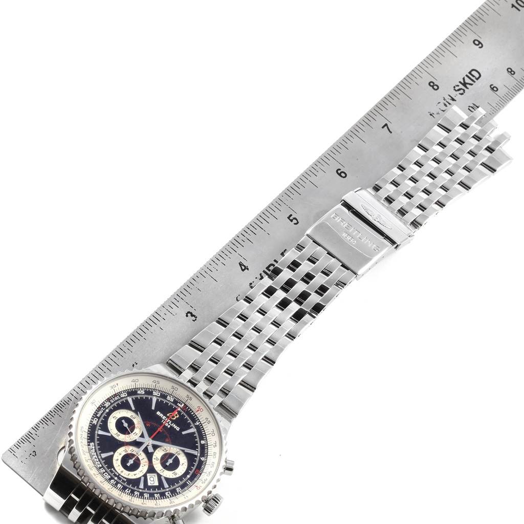 The image shows a Breitling Transocean A23351 Men's Stainless Steel Black Dial A23351 Men's Stainless Steel Black Dial watch from a top-down angle, displaying the face, bezel, and metal bracelet with a ruler for scale.