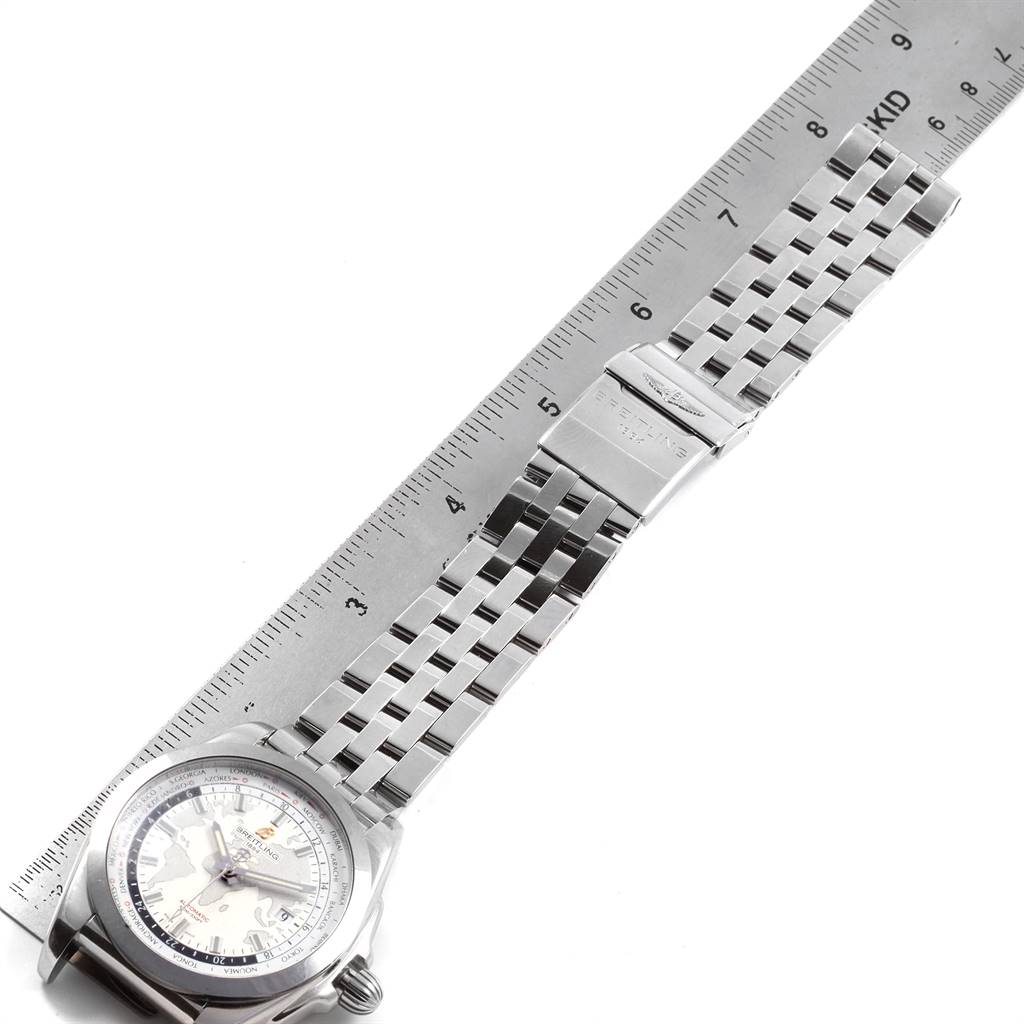The image shows a top view of the Breitling Galactic WB3510 Men's Stainless Steel White Dial WB3510 Men's Stainless Steel White Dial watch, focusing on its stainless steel bracelet and clasp alongside a ruler.