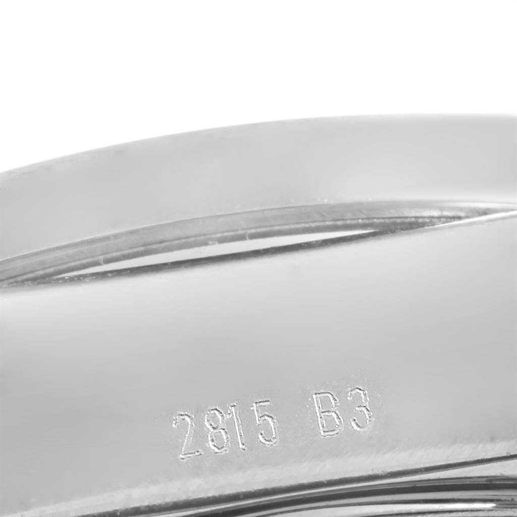 This close-up image shows a portion of the band or clasp of the Breitling Galactic WB3510 Men's Stainless Steel White Dial WB3510 Men's Stainless Steel White Dial watch, featuring an engraved model number "2815 B3."