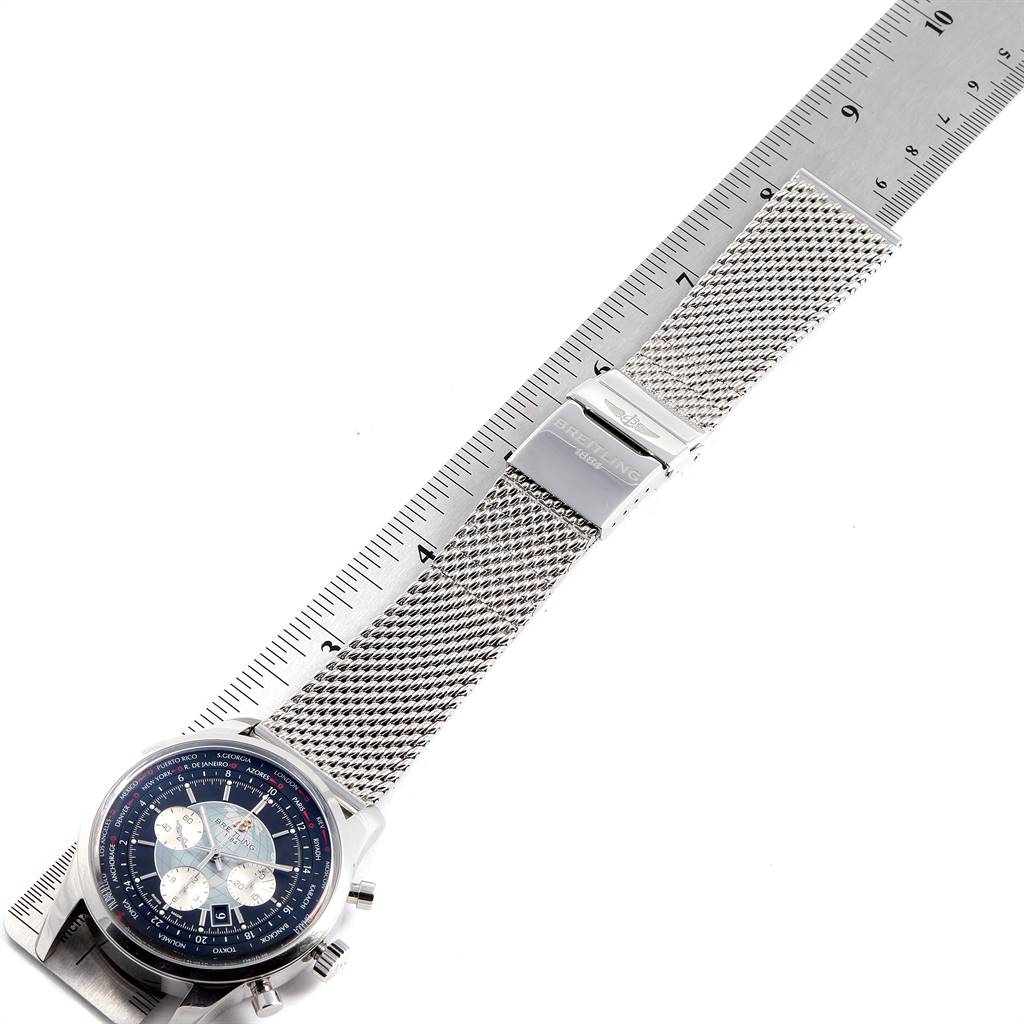 The image shows a Breitling Transocean AB0510 Men's Stainless Steel Silver Dial AB0510 Men's Stainless Steel Silver Dial watch from a top angle, including the face, mesh strap, and clasp next to a ruler.