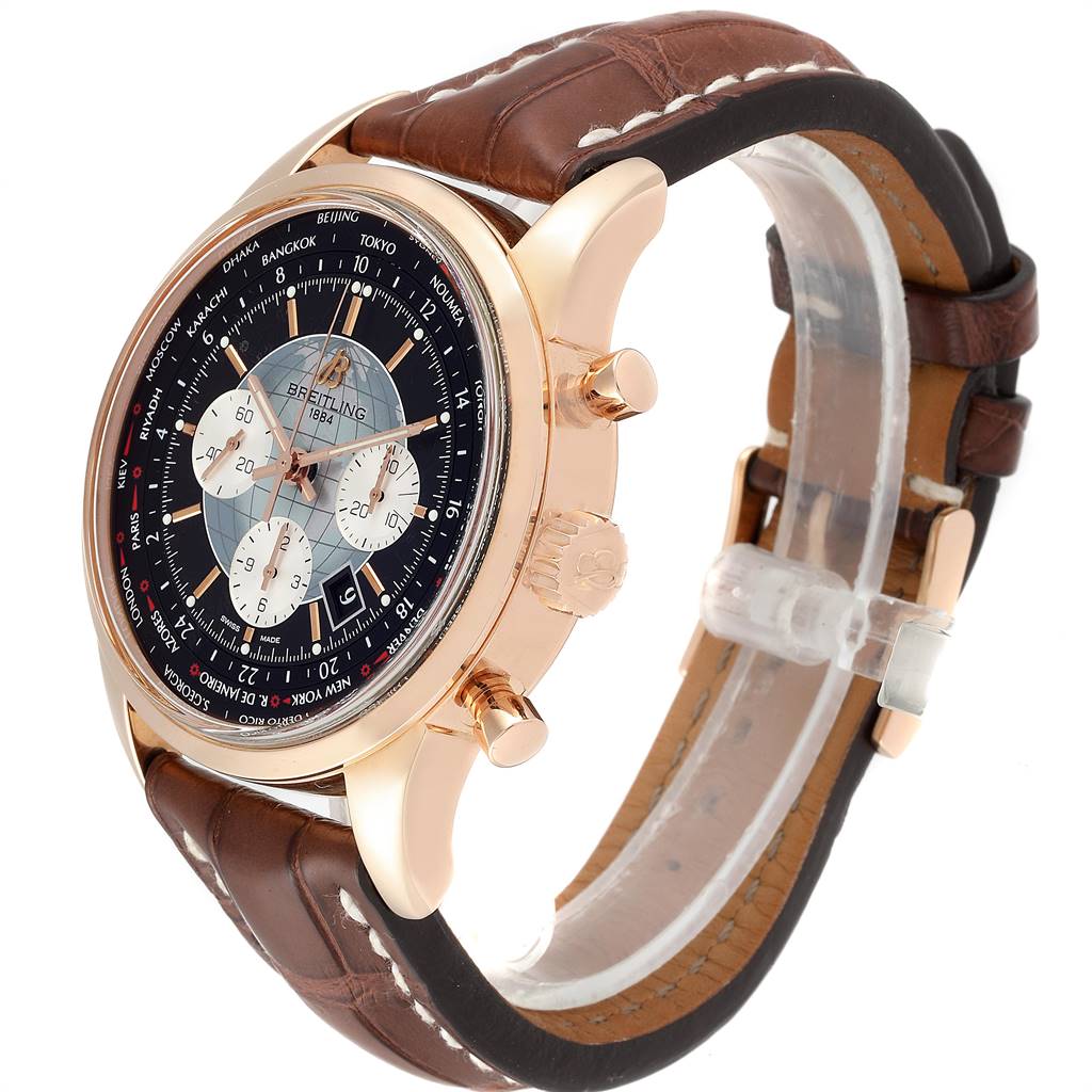 The image shows a Breitling Transocean RB0510U4-BB63BKLD Men's Rose Gold Black Dial RB0510U4-BB63BKLD Men's Rose Gold Black Dial watch at a three-quarter angle, highlighting its dial, crown, pushers, and brown leather strap.