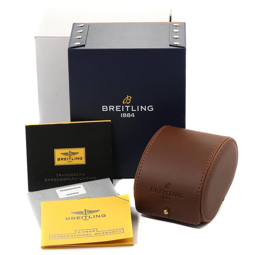 The image shows the box, warranty cards, leather case, and documentation for a Breitling Transocean AB0510 Men's Stainless Steel Silver Dial AB0510 Men's Stainless Steel Silver Dial watch.