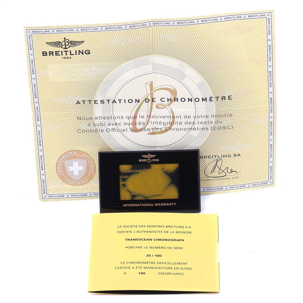 This image shows a certificate of authenticity, an international warranty card, and an additional authenticity document for the Breitling Transocean AB015212/BA99/154A Men's Stainless Steel Brown Dial AB015212/BA99/154A Men's Stainless Steel Brown Dial watch.