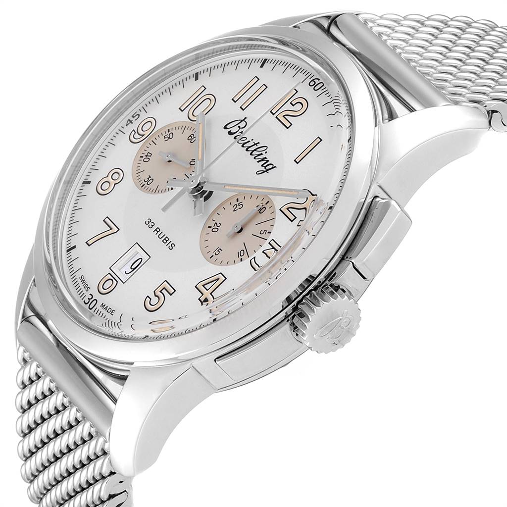 The Breitling Transocean AB141112/G799-154A Men's Stainless Steel Silver Dial AB141112/G799-154A Men's Stainless Steel Silver Dial watch is shown at a slight angle, displaying its crown, dial, subdials, and a segment of the mesh bracelet.