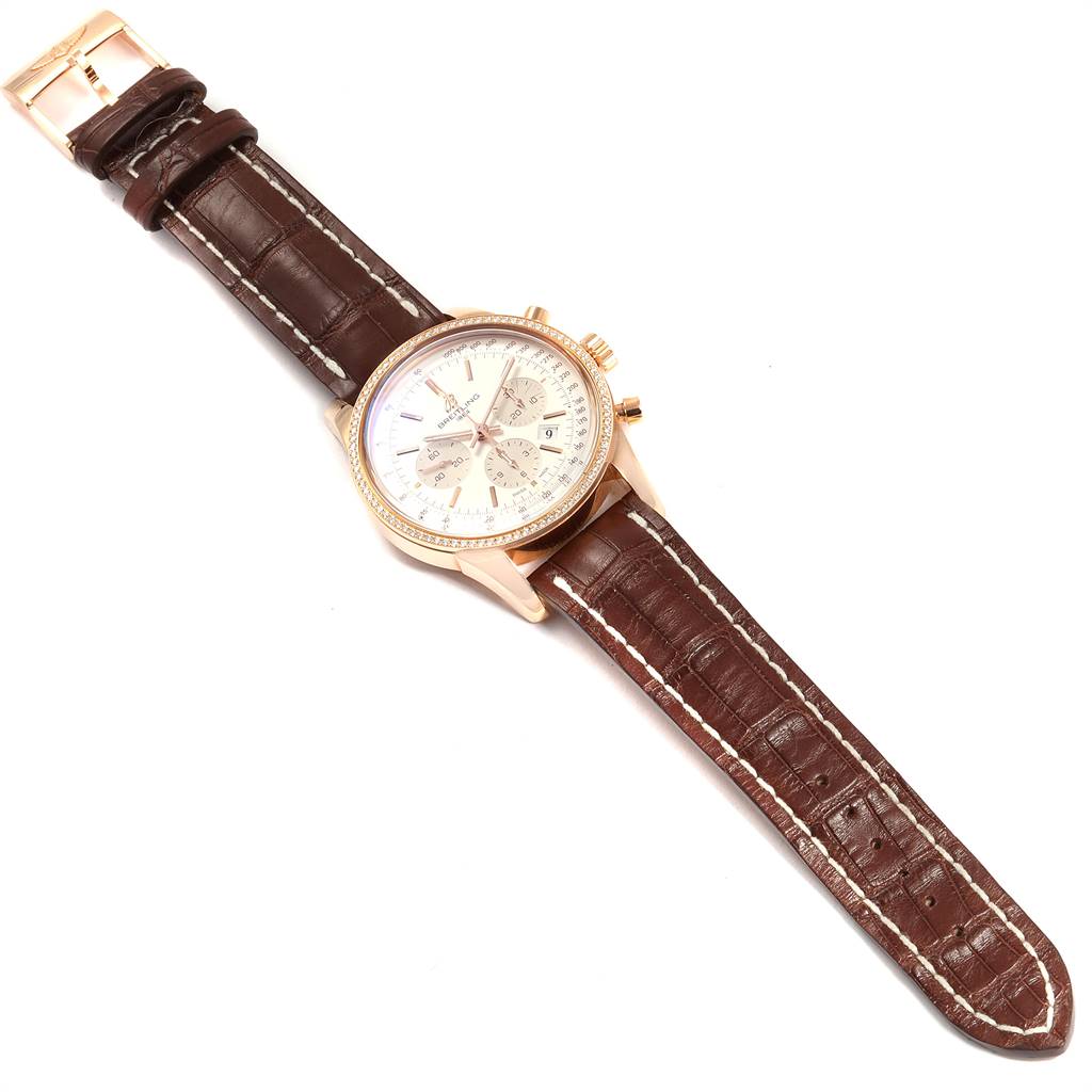 The Breitling Transocean RB0152 Men's Rose Gold Silver Dial RB0152 Men's Rose Gold Silver Dial watch is shown from the top, displaying the face, bezel, crown, and full leather strap.