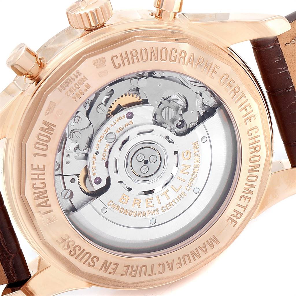 This image shows the back view of a Breitling Transocean RB0152 Men's Rose Gold Silver Dial RB0152 Men's Rose Gold Silver Dial watch, focusing on its exposed movement and internal mechanisms.