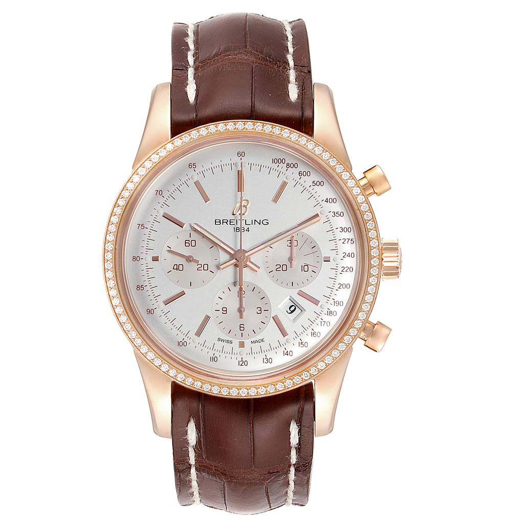 The image shows a front view of the Breitling Transocean RB0152 Men's Rose Gold Silver Dial RB0152 Men's Rose Gold Silver Dial watch, featuring a brown leather strap, rose gold case, and chronograph subdials.