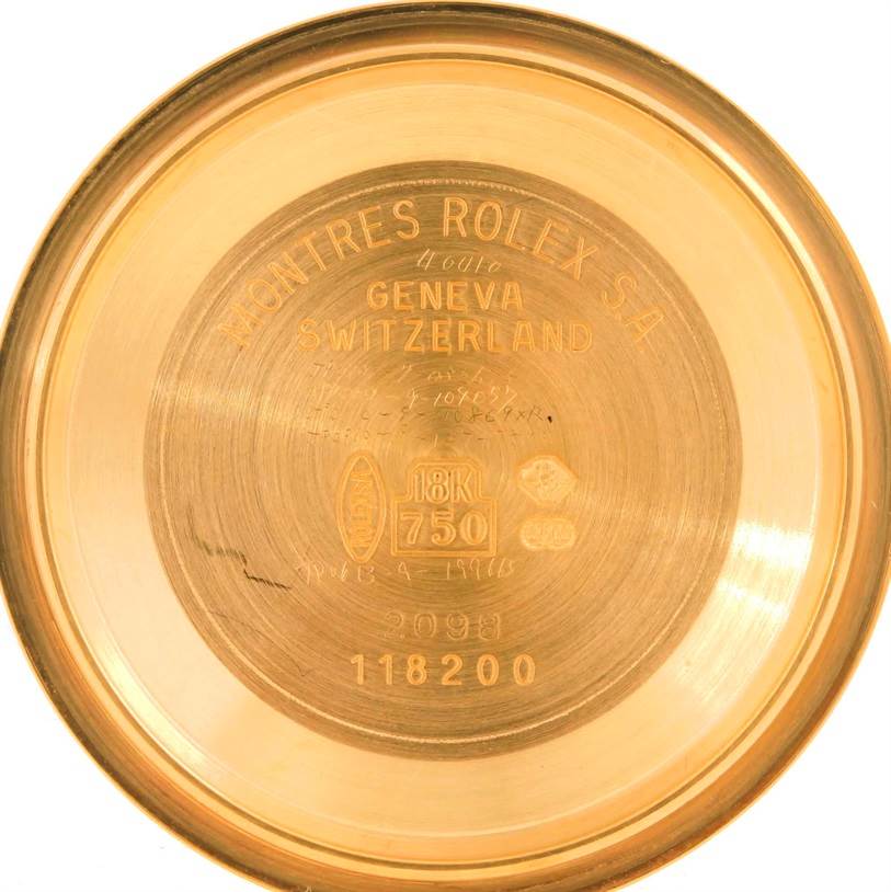 The image shows the engraved interior of the case back of a Rolex President 118238 Men's Yellow Gold Silver Dial 118238 Men's Yellow Gold Silver Dial model watch.