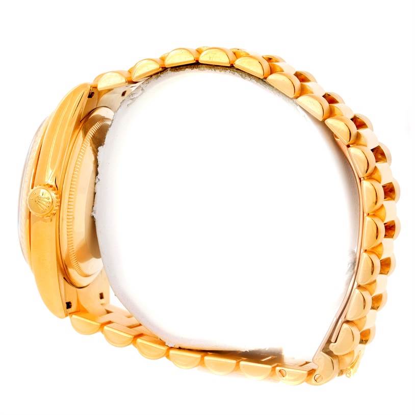 The image shows a side view of a Rolex President 118238 Men's Yellow Gold Silver Dial 118238 Men's Yellow Gold Silver Dial model watch, highlighting its golden case, bezel, crown, and bracelet.