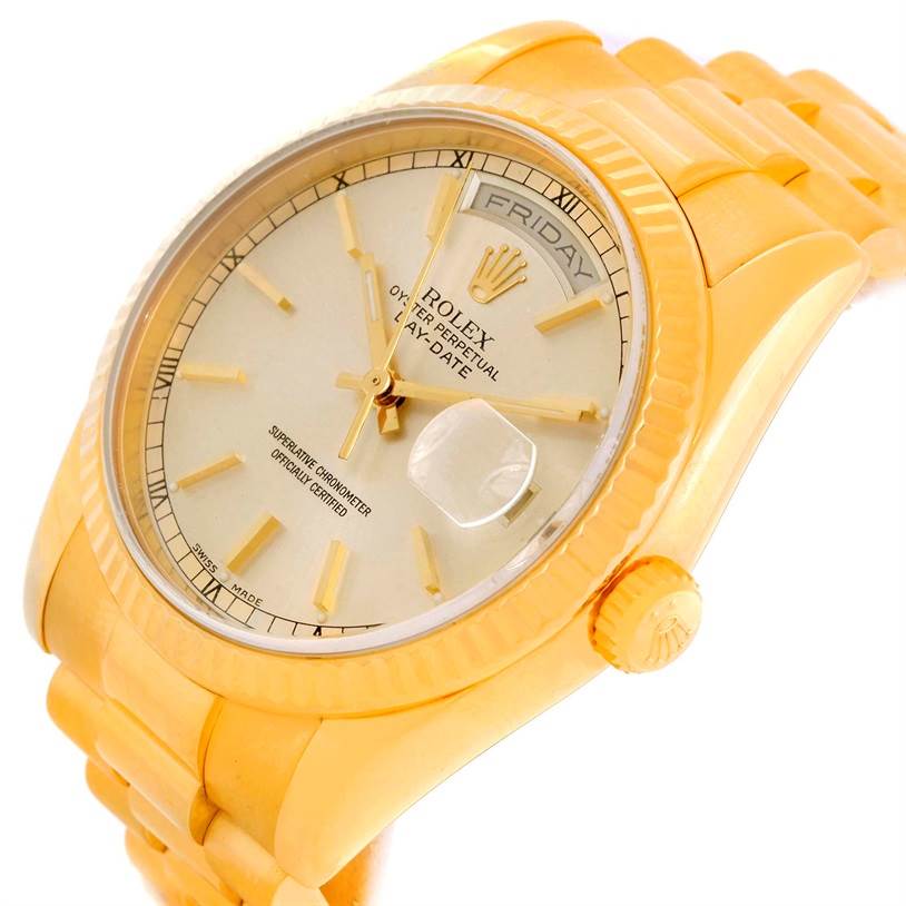 The image shows a close-up angle of a Rolex President 118238 Men's Yellow Gold Silver Dial 118238 Men's Yellow Gold Silver Dial model watch, displaying the dial, bezel, crown, and part of the bracelet.