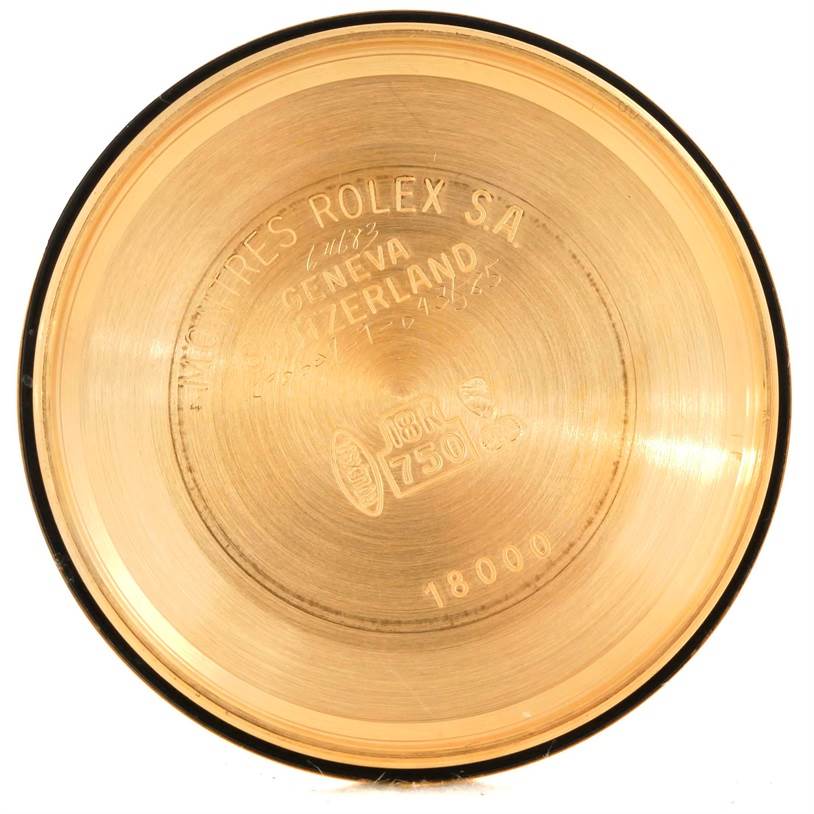 This image shows the interior case back of a Rolex President 18038 Men
s Yellow Gold Silver Dial 18038 Men
s Yellow Gold Silver Dial model watch, engraved with the brand and model details.