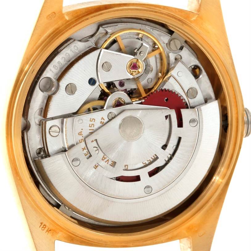 The image shows the inner mechanical components of the Rolex President 18038 Men
s Yellow Gold Silver Dial 18038 Men
s Yellow Gold Silver Dial model watch from the back angle.
