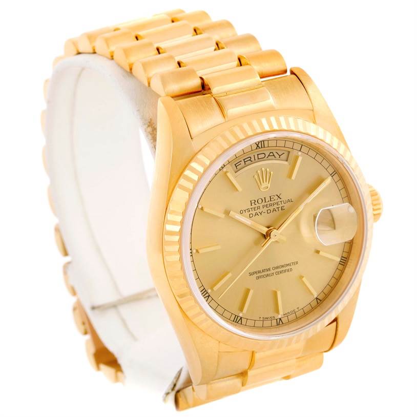 The image shows a Rolex President 18238 Men
s Yellow Gold Champagne Dial 18238 Men
s Yellow Gold Champagne Dial model watch from an angle highlighting the gold band, dial, and fluted bezel.