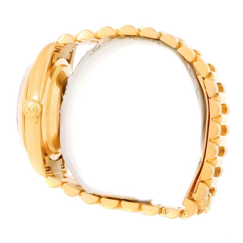 The image shows a side view of a Rolex President 18238 Men
s Yellow Gold Champagne Dial 18238 Men
s Yellow Gold Champagne Dial model watch, highlighting its gold casing and bracelet.