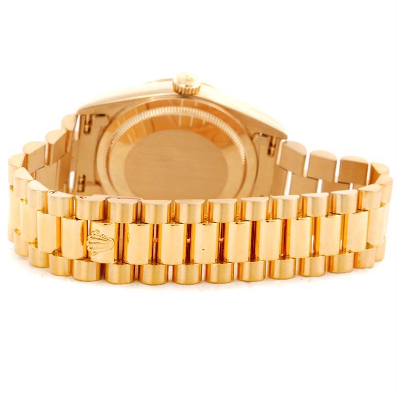 The image shows the back and bracelet of a Rolex President 18238 Men
s Yellow Gold Champagne Dial 18238 Men
s Yellow Gold Champagne Dial model watch, viewed from a rear angle.