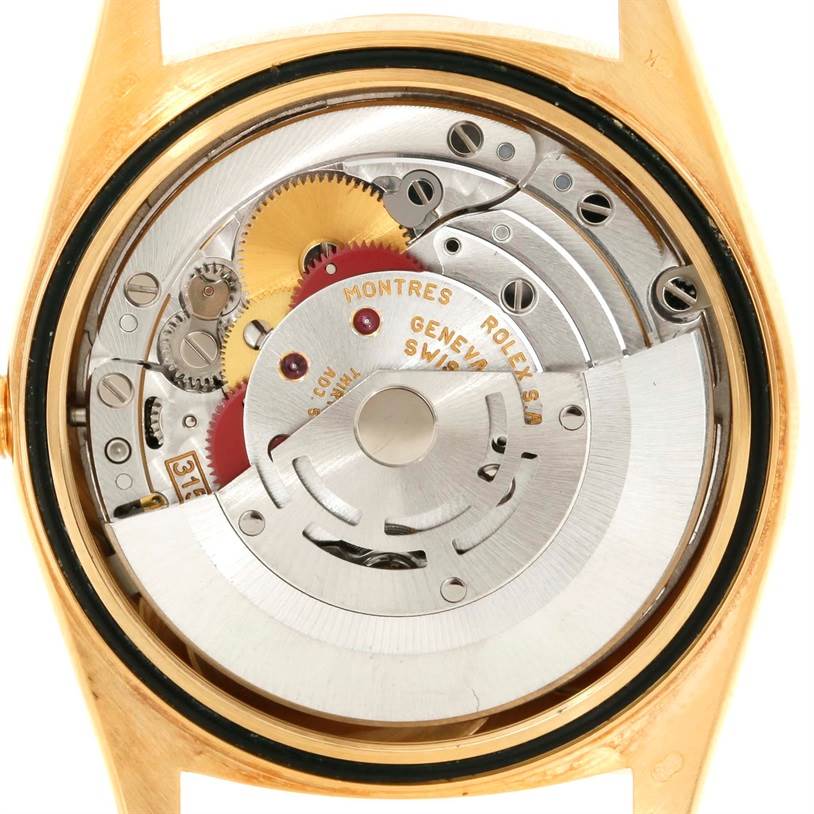 This image shows the back view of a Rolex President 18238 Men
s Yellow Gold Champagne Dial 18238 Men
s Yellow Gold Champagne Dial model watch, displaying the intricate internal movement components.