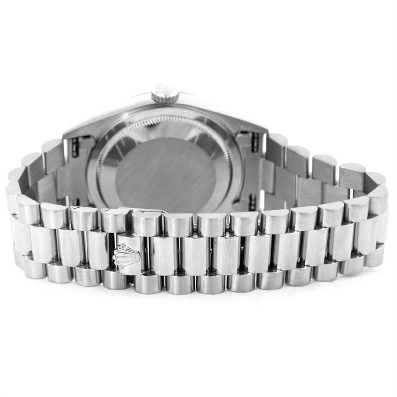 This image shows the backside of a Rolex President 18239 Men's White Gold Silver Dial 18239 Men's White Gold Silver Dial model watch, focusing on the case back and the bracelet links with the clasp.