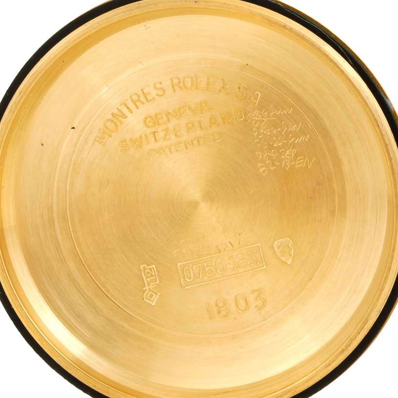 This image shows the inside case back of a Rolex President 1803 Men
s Yellow Gold Champagne Dial 1803 Men
s Yellow Gold Champagne Dial model watch, displaying engravings and hallmarks.