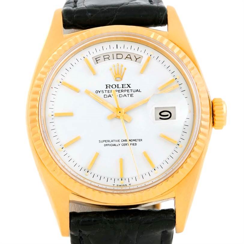 The image shows a front view of a Rolex President 1803 Men
s Yellow Gold White Dial 1803 Men
s Yellow Gold White Dial model watch with a white dial, gold case, black leather strap, and date display.