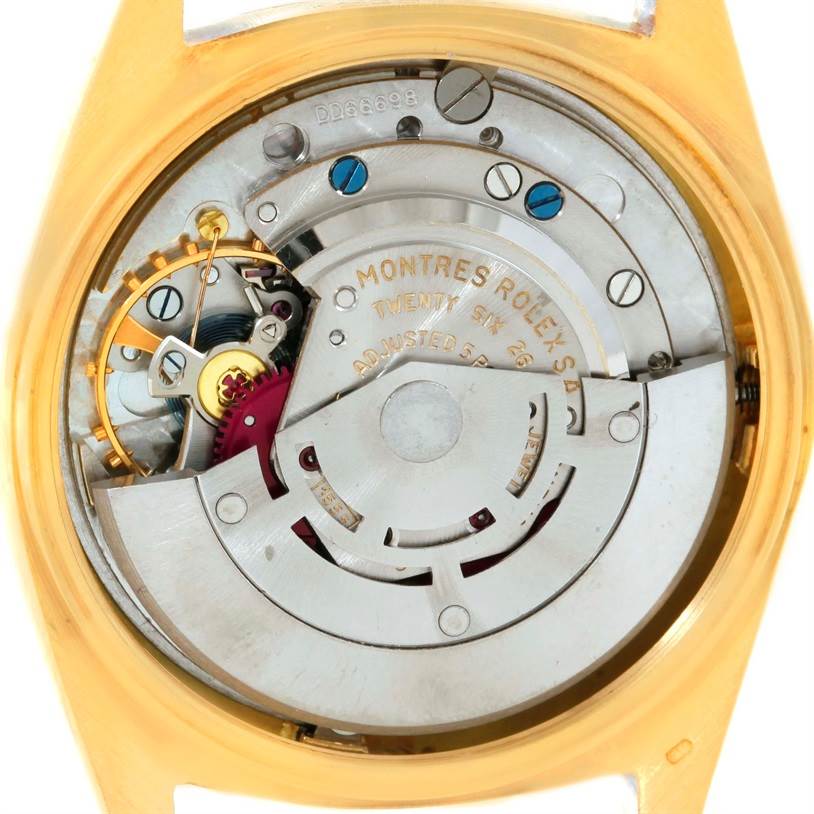 This image shows the back view of the Rolex President 1803 Men
s Yellow Gold White Dial 1803 Men
s Yellow Gold White Dial model, highlighting the internal movement mechanism.