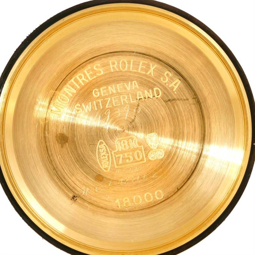The image shows the inside case back of a Rolex President 18038 Men
s Yellow Gold Champagne Dial 18038 Men
s Yellow Gold Champagne Dial watch, featuring inscriptions and hallmarks.
