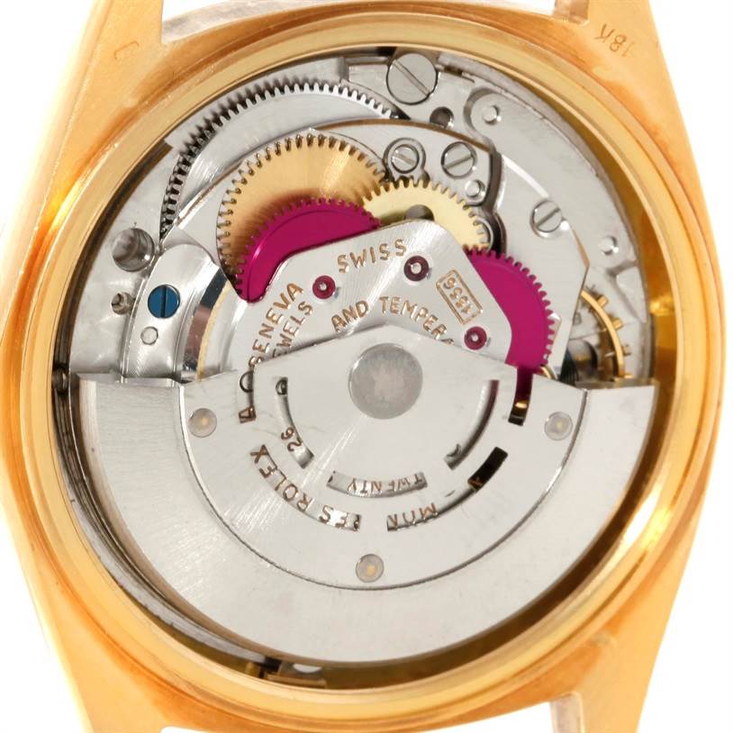 The image shows the internal mechanism and movement of the Rolex President 1803 Men
s Yellow Gold Champagne Dial 1803 Men
s Yellow Gold Champagne Dial watch model viewed from the back.