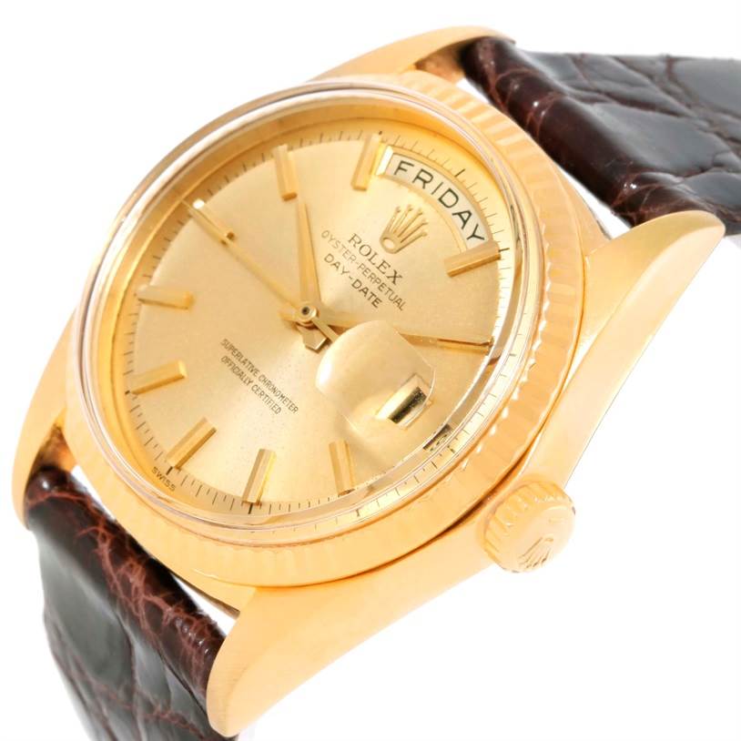 This image shows a close-up angled view of the Rolex President 1803 Men
s Yellow Gold Champagne Dial 1803 Men
s Yellow Gold Champagne Dial model watch, highlighting the face, crown, and part of the strap.